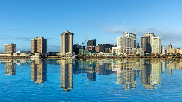 Scenic view to New Orleans skyline in morning light from river Mississipi