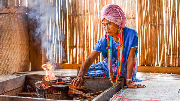 Old female karen hill tribe is cooking traditional